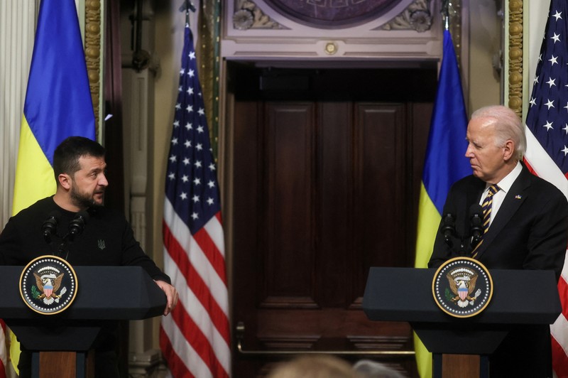 Biden US Ukraine Ukrainian President Volodymyr Zelenskyy speaks during a news conference with President Joe Biden in the Indian Treaty Room in the Eisenhower Executive Office Building on the White House Campus, Tuesday, Dec. 12, 2023, in Washington. (AP Photo/Evan Vucci)