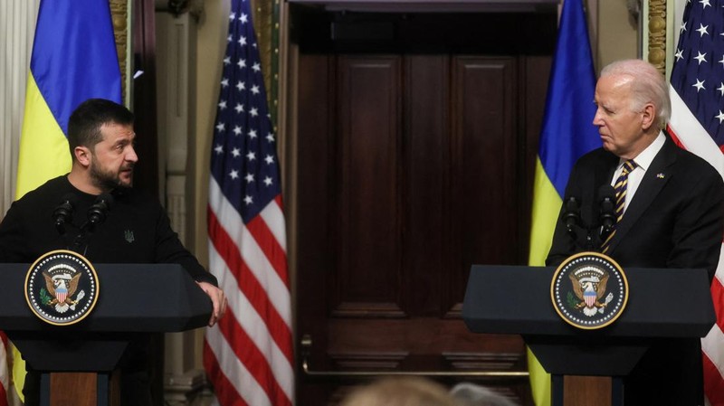 Ukrainian President Volodymyr Zelenskyy speaks during a news conference with President Joe Biden in the Indian Treaty Room in the Eisenhower Executive Office Building on the White House Campus, Tuesday, Dec. 12, 2023, in Washington. (AP Photo/Evan Vucci)