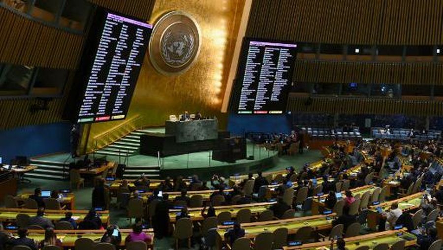 A general view shows a screen of votes during a United Nations General Assembly meeting to vote on a non-binding resolution demanding 