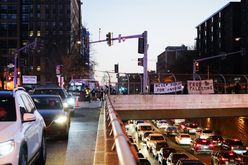 US Israel Palestinians Protestors calling for a ceasefire in the Israel-Hamas war block traffic on New York Avenue NW in Washington, Thursday, Dec. 14, 2023. (AP Photo/Stephanie Scarbrough)