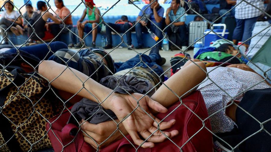 Migrants walk as they leave Tapachula in a caravan to attempt to reach the U.S. border, in the state of Chiapas, Mexico December 24, 2023. REUTERS/Jose Torres
