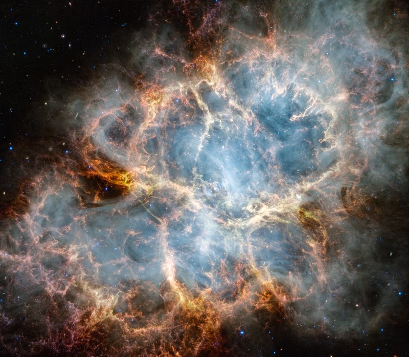 Intricate networks of gas and dust featured in the web-like spiral galaxy NGC 7496 are seen in a composite image taken by the James Webb Telescope and released by NASA on February 16, 2023. Eight red diffraction spikes extend out from its extremely bright core. Colorful dots in the background represent background galaxies. NASA/ESA/Handout via REUTERS   THIS IMAGE HAS BEEN SUPPLIED BY A THIRD PARTY