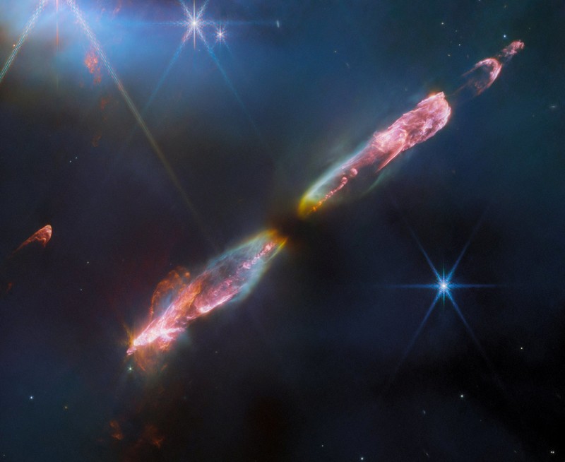 Intricate networks of gas and dust featured in the web-like spiral galaxy NGC 7496 are seen in a composite image taken by the James Webb Telescope and released by NASA on February 16, 2023. Eight red diffraction spikes extend out from its extremely bright core. Colorful dots in the background represent background galaxies. NASA/ESA/Handout via REUTERS   THIS IMAGE HAS BEEN SUPPLIED BY A THIRD PARTY