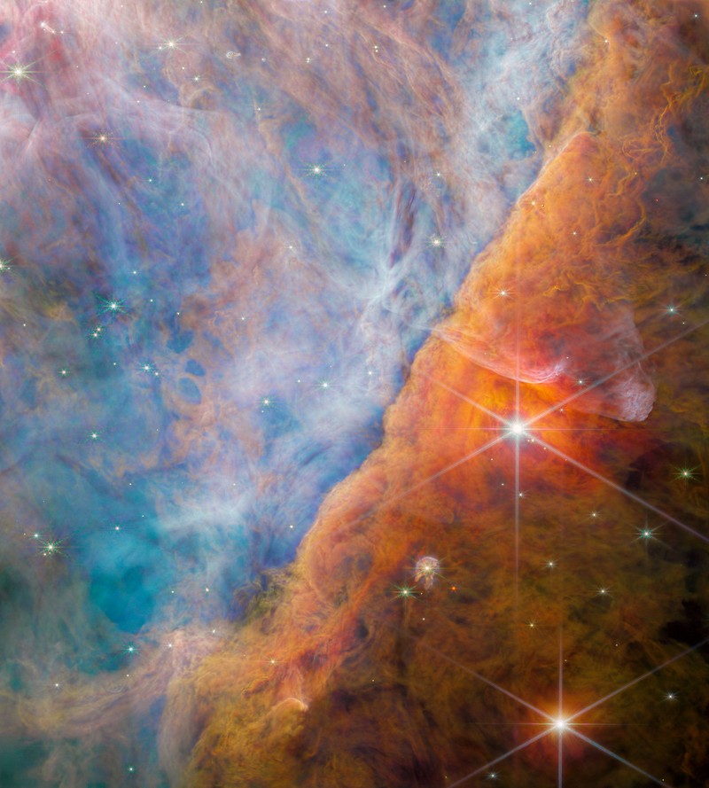 Intricate networks of gas and dust featured in the web-like spiral galaxy NGC 7496 are seen in a composite image taken by the James Webb Telescope and released by NASA on February 16, 2023. Eight red diffraction spikes extend out from its extremely bright core. Colorful dots in the background represent background galaxies. NASA/ESA/Handout via REUTERS   THIS IMAGE HAS BEEN SUPPLIED BY A THIRD PARTY