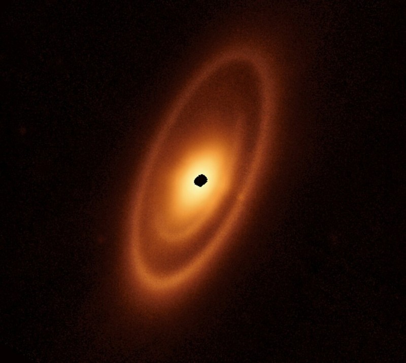 Intricate networks of gas and dust featured in the web-like spiral galaxy NGC 7496 are seen in a composite image taken by the James Webb Telescope and released by NASA on February 16, 2023. Eight red diffraction spikes extend out from its extremely bright core. Colorful dots in the background represent background galaxies. NASA/ESA/Handout via REUTERS   THIS IMAGE HAS BEEN SUPPLIED BY A THIRD PARTY