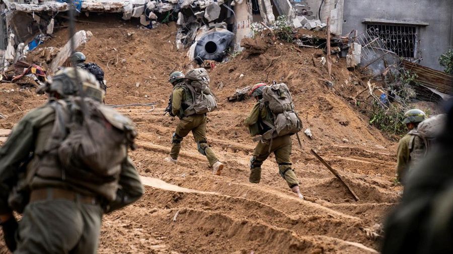 Israeli soldiers operate in the Gaza Strip amid the ongoing conflict between Israel and the Palestinian Islamist group Hamas, in this handout picture released on December 31, 2023. Israel Defense Forces/Handout via REUTERS THIS IMAGE HAS BEEN SUPPLIED BY A THIRD PARTY