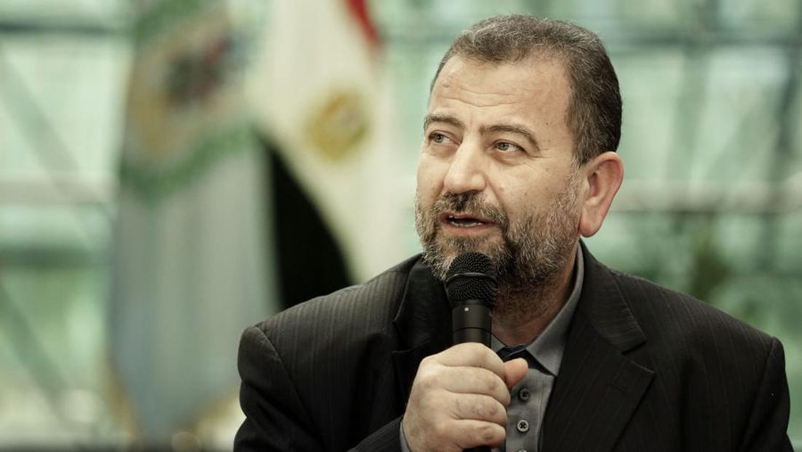 Hamas' representative, Saleh al-Arouri, speaks after signing a reconciliation deal with senior Fatah official Azzam al-Ahmad, during a short ceremony at the Egyptian intelligence complex in Cairo, Egypt, Thursday, Oct. 12, 2017. Thursday's signing came after two days of negotiations in the Egyptian capital on the governing of the Gaza Strip as part of the most serious effort to date to end the 10 year rift between the rival Palestinian groups. (AP Photo/Nariman El-Mofty)