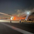 A Japan Airlines (JAL) plane sits on fire after it collided with a Coast Guard aircraft on the ground at Tokyo's Haneda airport, Japan, January 2, 2024 in this image obtained from social media. Obtained by Reuters/via REUTERS  THIS IMAGE HAS BEEN SUP