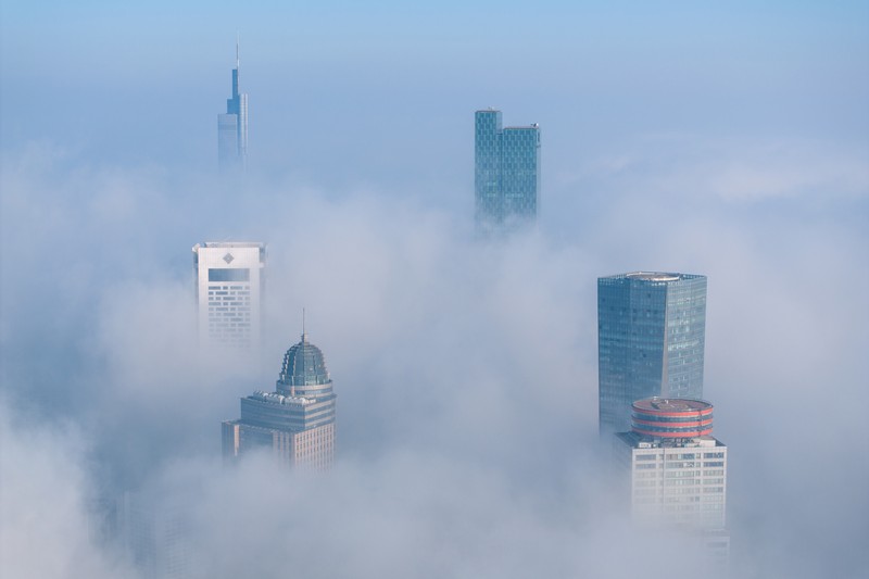1898128709 NANJING, CHINA - JANUARY 4, 2024 - Aerial photo shows skyscrapers looming in heavy fog in the main urban area of Nanjing, East China's Jiangsu province, Jan 4, 2024. (Photo credit should read CFOTO/Future Publishing via Getty Images)