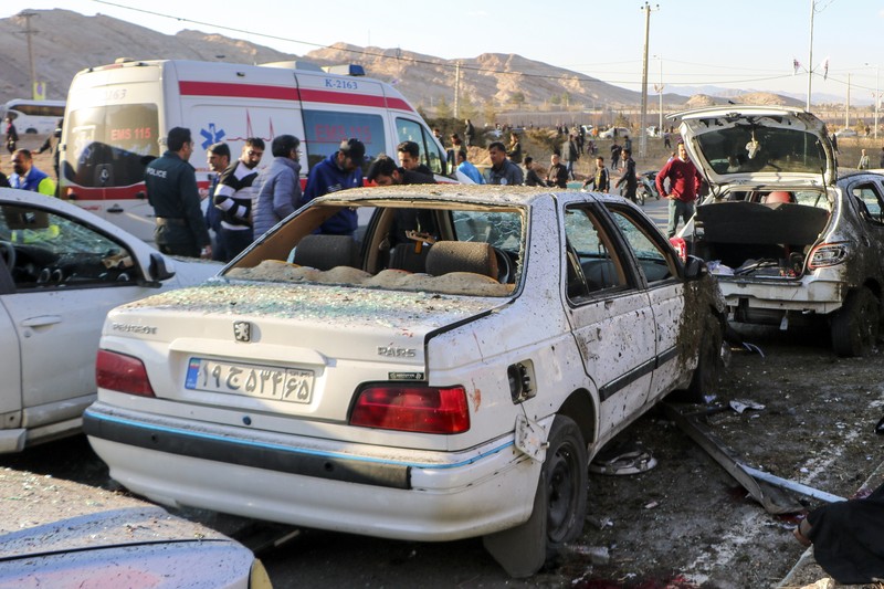 Iran Explosions This image, provided by Maxar Technologies, shows cars and buses near the martyr's cemetery in Kerman, Iran Wednesday, Jan. 3, 2024 before, according to Iranian authorities, twin bomb blasts killed at least 103 people at an event honoring a prominent Iranian general slain in a U.S. airstrike in 2020. (Satellite image ©2023 Maxar Technologies via AP)