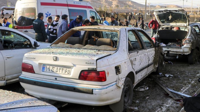 This image, provided by Maxar Technologies, shows cars and buses near the martyr's cemetery in Kerman, Iran Wednesday, Jan. 3, 2024 before, according to Iranian authorities, twin bomb blasts killed at least 103 people at an event honoring a prominent Iranian general slain in a U.S. airstrike in 2020. (Satellite image ©2023 Maxar Technologies via AP)