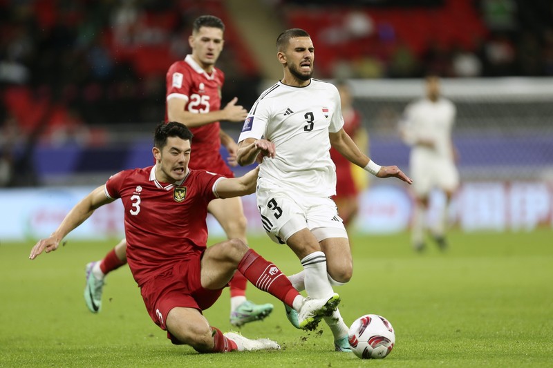 Laga Indonesia melawan Irak dalam lanjutan grup D Piala Asia 2023 di Qatar. (AP Photo/Hussein Sayed) Laga Indonesia melawan Irak dalam lanjutan grup D Piala Asia 2023 di Qatar. (AP Photo/Hussein Sayed)