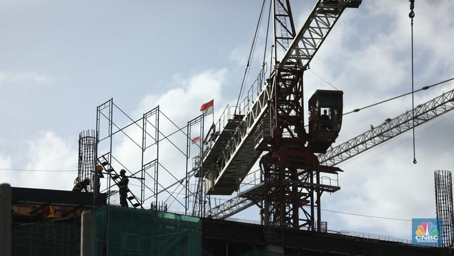 Suasana proyek pembangunan Ibu Kota Negara (IKN) Nusantara terus dikebut. Ditargetkan mulai bulan Juli 2024, Aparatur Sipil Negara (ASN), termasuk PNS dan PPPK, bisa mulai menempati kawasan ibu kota baru, Sepaku, Kabupaten Penajam Paser Utara, Kalimantan Timur, Kamis, (19/1/2024). (CNBC Indonesia/Tri Susilo)