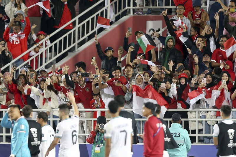 Qatar Vietnam Indonesia Asian Cup Soccer Fans watch the Asian Cup Group D soccer match between Vietnam and Indonesia at Abdullah Bin Khalifa Stadium in Doha, Qatar, Friday, Jan. 19, 2024. (AP Photo/Hussein Sayed)
