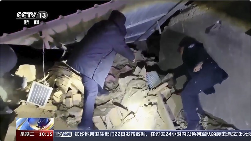China Quake In this image taken from video footage run by China's CCTV, rescuers work near the rubble from an earthquake in Kizilsu Kirghiz Autonomous Prefecture, China’s western Xinjiang region Tuesday, Jan. 23, 2024. A strong earthquake struck China’s far western Xinjiang region early Tuesday, knocking out power and destroying homes, local authorities and state media reported. (CCTV via AP)