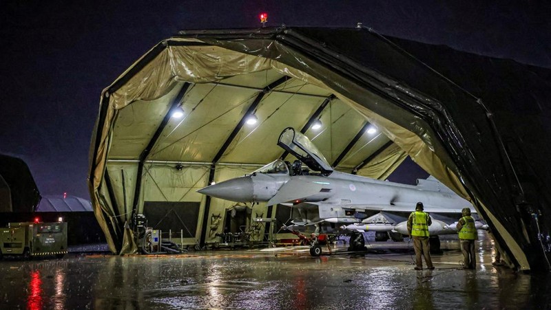 RAF Armourers (Weapon Technicians) prepare a Royal Air Force Typhoon FGR4.Royal Air Force Typhoon aircraft have conducted precision strike operations against Houthi military targets in response to further attacks on shipping in the Red Sea, in this undated handout image. UK MOD/Handout via REUTERS THIS IMAGE HAS BEEN SUPPLIED BY A THIRD PARTY NO RESALES. NO ARCHIVES. MANDATORY CREDIT