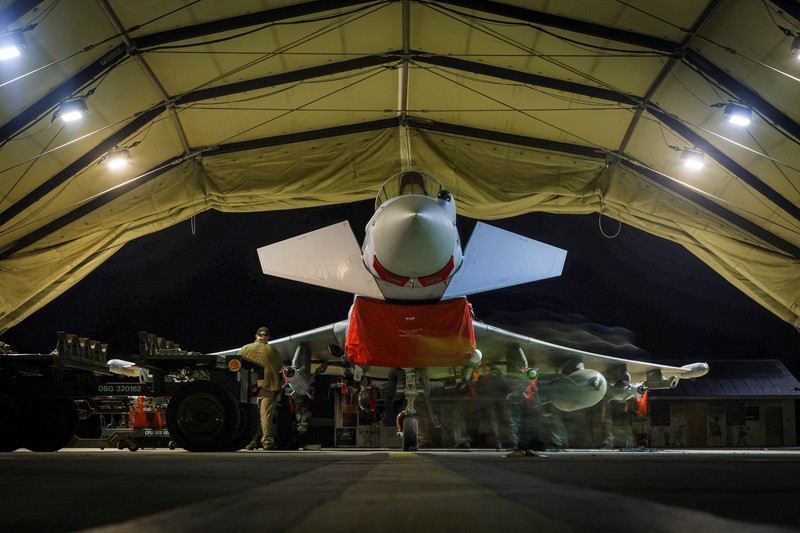 YEMEN-HOUTHIS/BRITAIN RAF Armourers (Weapon Technicians) prepare a Royal Air Force Typhoon FGR4.Royal Air Force Typhoon aircraft have conducted precision strike operations against Houthi military targets in response to further attacks on shipping in the Red Sea, in this undated handout image. UK MOD/Handout via REUTERS THIS IMAGE HAS BEEN SUPPLIED BY A THIRD PARTY NO RESALES. NO ARCHIVES. MANDATORY CREDIT
