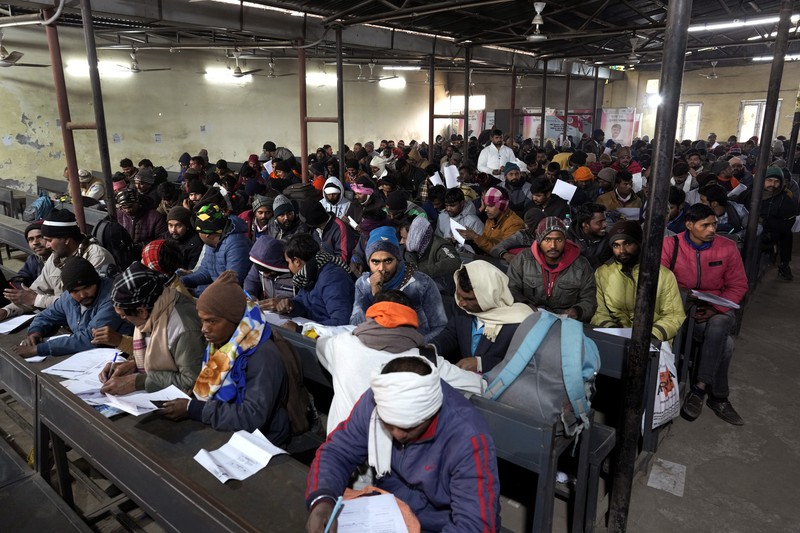 India Israel Workers Indian workers aspiring to be hired for jobs in Israel line up during a recruitment drive in Lucknow, India, Thursday, Jan. 25, 2024. (AP Photo/Rajesh Kumar Singh)