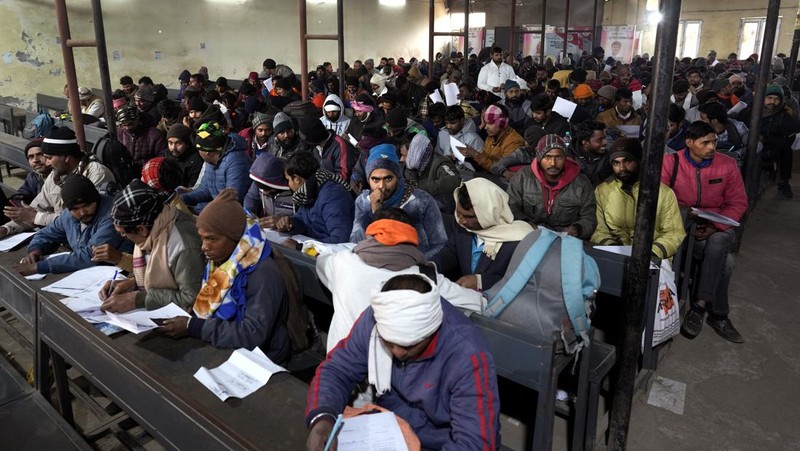 Indian workers aspiring to be hired for jobs in Israel line up during a recruitment drive in Lucknow, India, Thursday, Jan. 25, 2024. (AP Photo/Rajesh Kumar Singh)