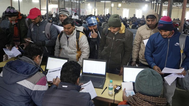 Indian workers aspiring to be hired for jobs in Israel line up during a recruitment drive in Lucknow, India, Thursday, Jan. 25, 2024. (AP Photo/Rajesh Kumar Singh)