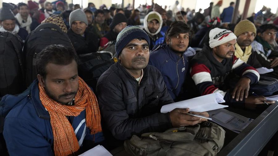 Indian workers aspiring to be hired for jobs in Israel line up during a recruitment drive in Lucknow, India, Thursday, Jan. 25, 2024. (AP Photo/Rajesh Kumar Singh)