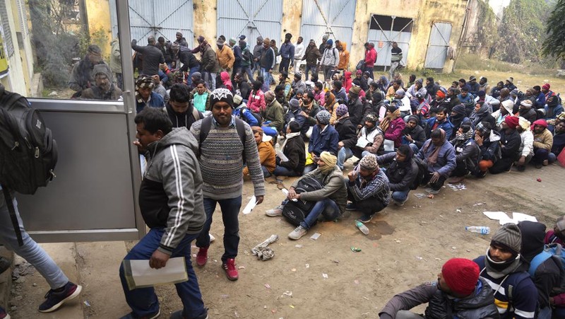 Indian workers aspiring to be hired for jobs in Israel line up during a recruitment drive in Lucknow, India, Thursday, Jan. 25, 2024. (AP Photo/Rajesh Kumar Singh)