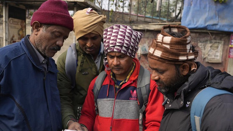 Indian workers aspiring to be hired for jobs in Israel line up during a recruitment drive in Lucknow, India, Thursday, Jan. 25, 2024. (AP Photo/Rajesh Kumar Singh)