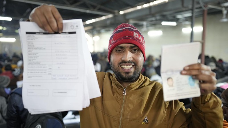 Indian workers aspiring to be hired for jobs in Israel line up during a recruitment drive in Lucknow, India, Thursday, Jan. 25, 2024. (AP Photo/Rajesh Kumar Singh)