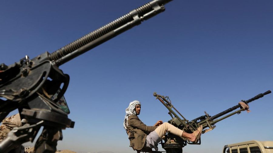An armed Houthi follower mans a machine gun on a pick-up truck during a protest to decry the U.S.-led strikes on Houthi targets and to show support to Palestinians in the Gaza Strip, amid the ongoing conflict between Israel and the Palestinian Islamist group Hamas, near Sanaa, Yemen January 25, 2024. REUTERS/Khaled Abdullah