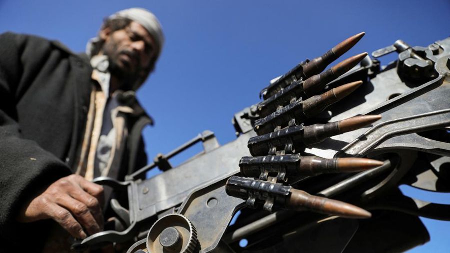 An armed Houthi follower mans a machine gun on a pick-up truck during a protest to decry the U.S.-led strikes on Houthi targets and to show support to Palestinians in the Gaza Strip, amid the ongoing conflict between Israel and the Palestinian Islamist group Hamas, near Sanaa, Yemen January 25, 2024. REUTERS/Khaled Abdullah