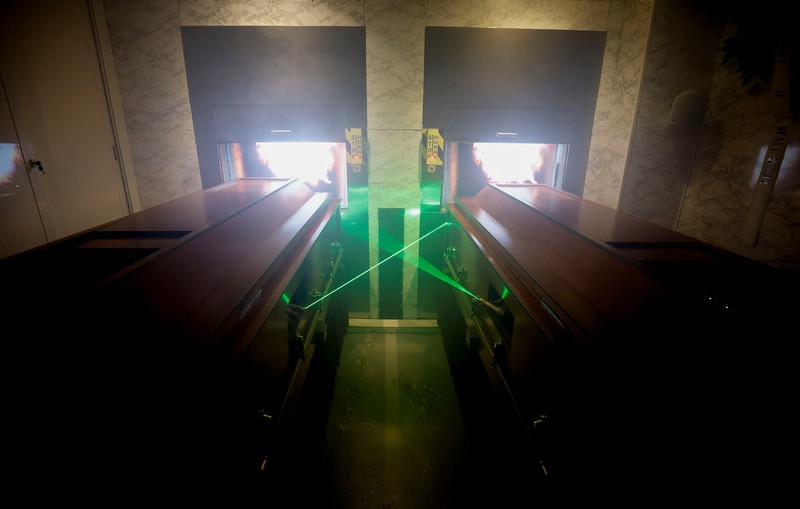 A couple of gamers, Miriam Castella and Carlos Granedo, participate in an extreme escape room named Catalepsia, which takes place inside two coffins simulating their funeral and trying to escape from them by working in pairs to solve puzzles and tricks, in Barcelona, Spain, January 18, 2024. REUTERS/ Albert Gea