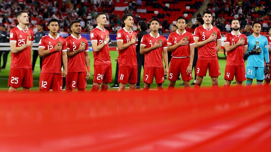Soccer Football - AFC Asian Cup - Group D - Indonesia v Iraq - Ahmad bin Ali Stadium, Al Rayyan, Qatar - January 15, 2024  Indonesia players line up during the national anthems before the match REUTERS/Ibraheem Al Omari
