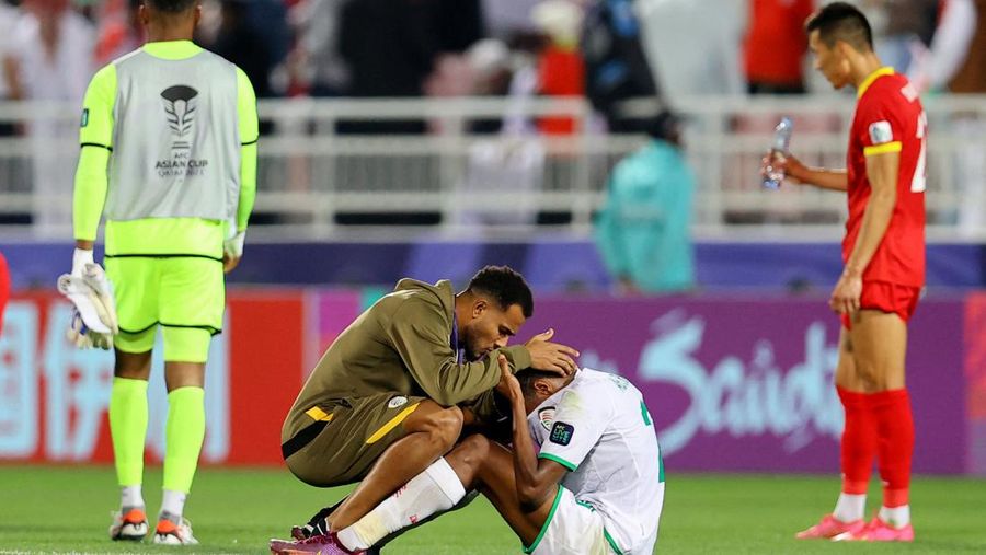Soccer Football - AFC Asian Cup - Group F - Kyrgyzstan v Oman - Abdullah bin Khalifa Stadium, Doha, Qatar - January 25, 2024 Oman's Abdul Rahman Al Mushaifri looks dejected after the match REUTERS/Ibraheem Al Omari