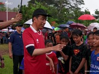 Main Bola Hujan-hujanan, Ini Pesan Jokowi Jelang Timnas Vs Australia