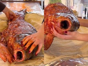 Keluarga Ini Masak Ikan Panggang Raksasa yang Disebut Mirip Ikan Siluman