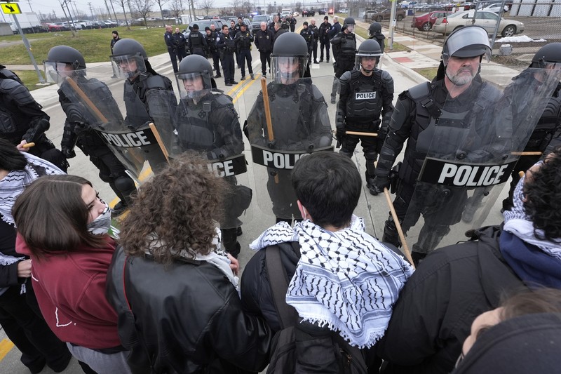 Protestors rally for a Cease Fire in Gaza outside a UAW union hall during a visit by U.S. President Joe Biden in Warren Michigan, U.S. February 1, 2024. (REUTERS/Rebecca Cook)