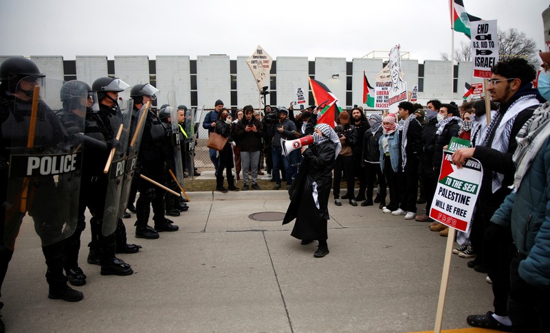 Protestors rally for a Cease Fire in Gaza outside a UAW union hall during a visit by U.S. President Joe Biden in Warren Michigan, U.S. February 1, 2024. (REUTERS/Rebecca Cook)