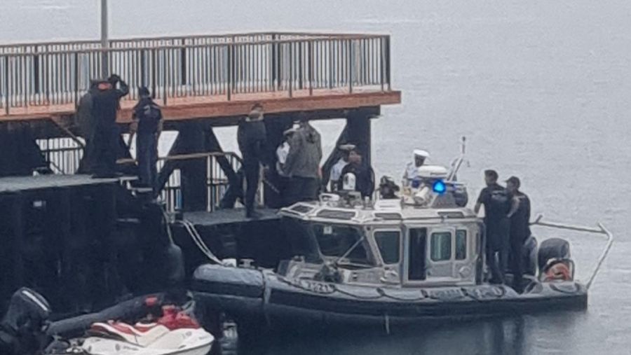 Police officials work in Lago Ranco following Chile's former President Sebastian Pinera dies in helicopter crash, Chile, February 6, 2024. in this picture. Heverd Alarcon/Canal del sur /via REUTERS  THIS IMAGE HAS BEEN SUPPLIED BY A THIRD PARTY. MANDATORY CREDIT. NO RESALES. NO ARCHIVES. REFILE - QUALITY REPEAT