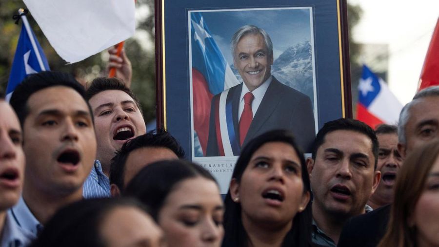 Police officials work in Lago Ranco following Chile's former President Sebastian Pinera dies in helicopter crash, Chile, February 6, 2024. in this picture. Heverd Alarcon/Canal del sur /via REUTERS  THIS IMAGE HAS BEEN SUPPLIED BY A THIRD PARTY. MANDATORY CREDIT. NO RESALES. NO ARCHIVES. REFILE - QUALITY REPEAT