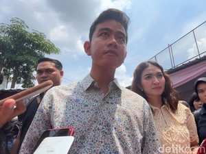 Gibran dan Selvi Dapat Cokelat Usai Nyoblos di TPS 34 Manahan