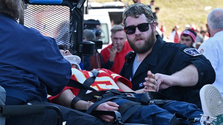 Feb 14, 2024; Kansas City, MO, USA; Fans receive medical assistance after shots were fired after the celebration of the Kansas City Chiefs winning Super Bowl LVIII. Mandatory Credit: David Rainey-USA TODAY Sports