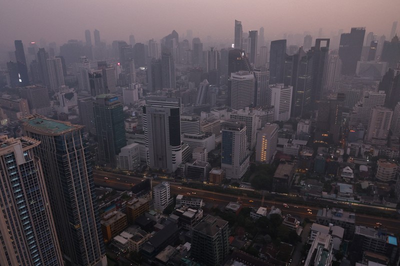THAILAND-POLLUTION/ A view of the city amid air pollution during sunrise in Bangkok, Thailand, February 15, 2024. REUTERS/Athit Perawongmetha