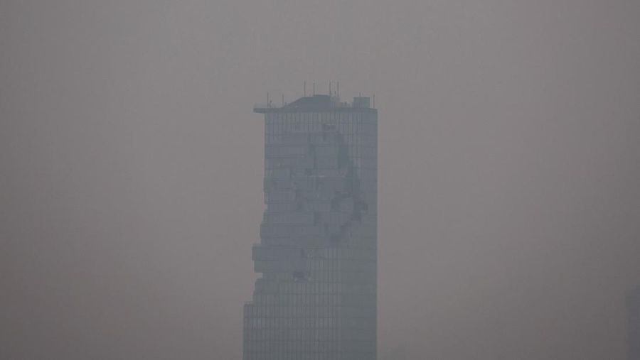 A view of the city amid air pollution during sunrise in Bangkok, Thailand, February 15, 2024. REUTERS/Athit Perawongmetha