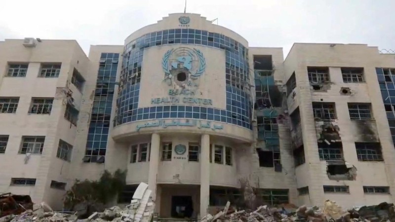 A view of the damaged exterior of a UNRWA health centre, amid the ongoing conflict between Israel and the Palestinian Islamist group Hamas, in Gaza, in this still image taken from video released February 15, 2024.     UNRWA/Handout via REUTERS    THIS IMAGE HAS BEEN SUPPLIED BY A THIRD PARTY. NO RESALES. NO ARCHIVES. MANDATORY CREDIT