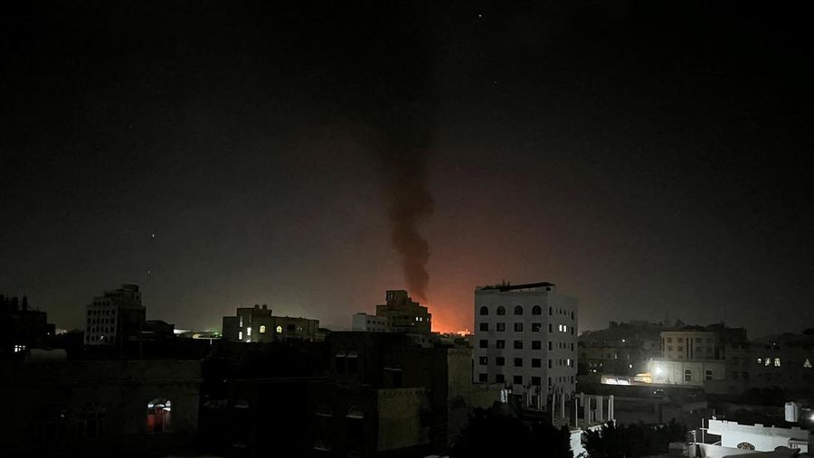 Smoke rises in the sky following U.S-led airstrikes in Sanaa, Yemen, February 25, 2024. REUTERS/Abdulrhman Al Ansi