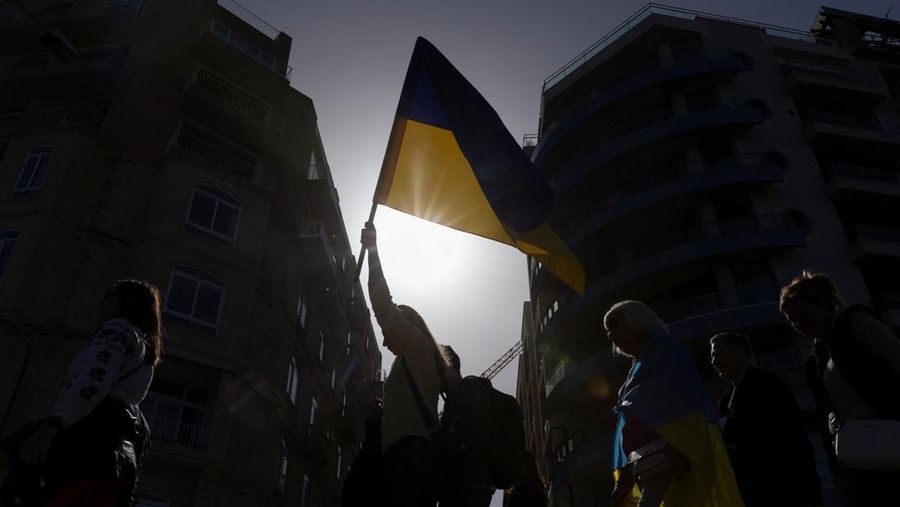 Members of the Ukrainian community and Maltese supporters take part in a protest march to mark the second anniversary of Russia's invasion of Ukraine, in Sliema, Malta February 24, 2024. REUTERS/Darrin Zammit Lupi