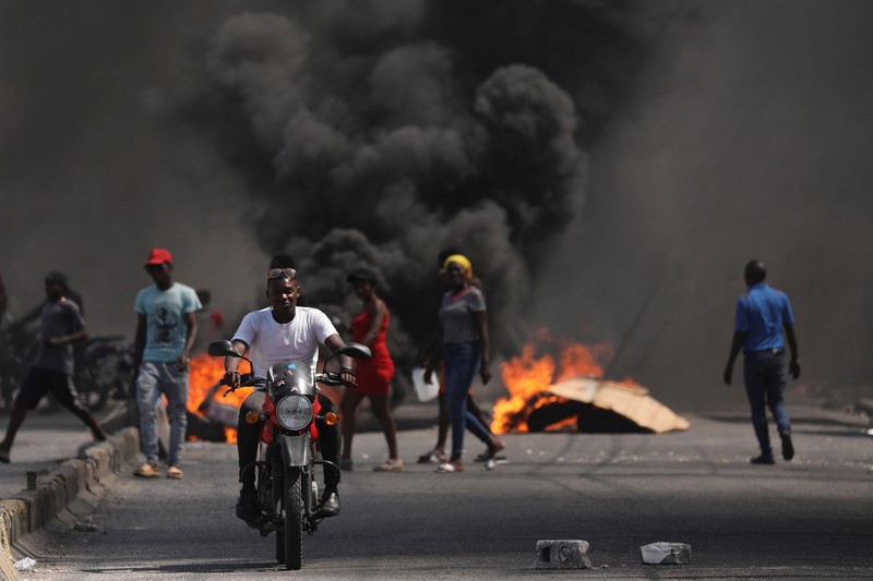 Suasana bentrokan pecah di Haiti, geng kriminal tuntut Perdana Menteri Ariel Henry mundur. (REUTERS/Ralph Tedy Erol) Suasana bentrokan pecah di Haiti, geng kriminal tuntut Perdana Menteri Ariel Henry mundur. (REUTERS/Ralph Tedy Erol)