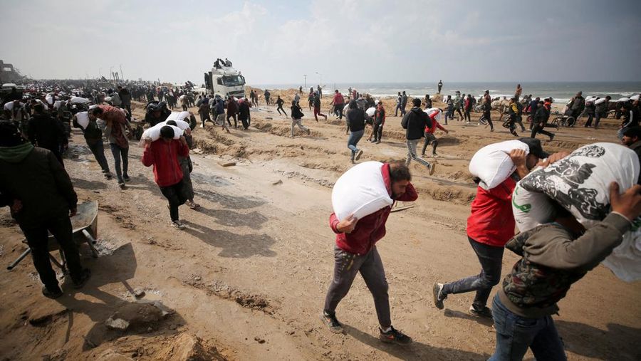 U.S. Air Force drops humanitarian aid for Gaza residents, in this screengrab from a video released on March 5, 2024. US Central Command via X/Handout via REUTERS    THIS IMAGE HAS BEEN SUPPLIED BY A THIRD PARTY
