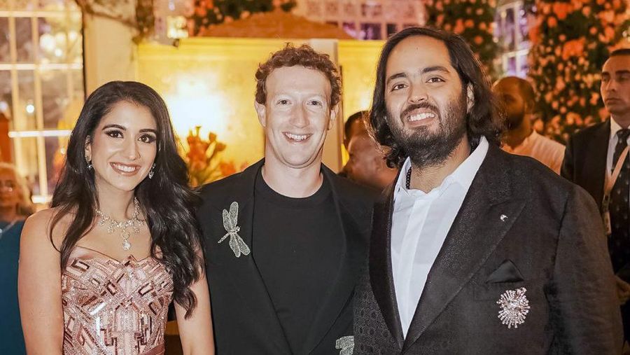 This photograph released by the Reliance group shows Mark Zuckerberg, center, posing for a photograph with   billionaire industrialist Mukesh Ambani's son Anant Ambani, right, and Radhika Merchant at their pre-wedding bash in Jamnagar, India, Saturday, Mar. 02, 2024. (Reliance group via AP)