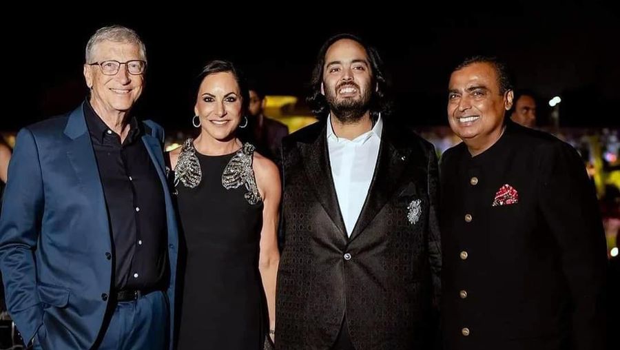 This photograph released by the Reliance group shows R to L, billionaire industrialist Mukesh Ambani, Anant Ambani, Paula Hurd, and Bill Gates posing for a photograph at a pre-wedding bash of Mukesh Ambani's son Anant in Jamnagar, India, Saturday, Mar. 02, 2024. (Reliance group via AP)